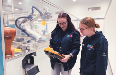 Two women in robotics lab